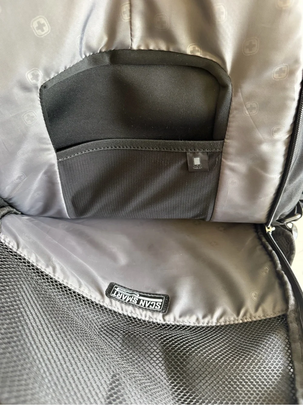 SwissGear Black Backpack with Red Cross Emblem Smart scan